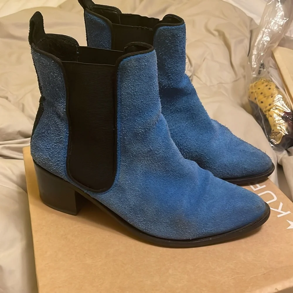 Channel your inner Elvis in blue suede booties. Size 7.5. Kurt Geiger